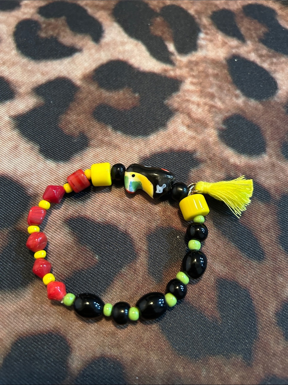 Hand Crafted Colorful Toucan Stretch Bracelet - Black, Yellow, Red, Green